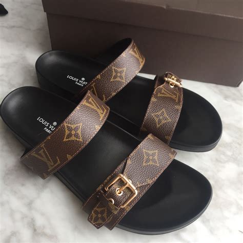 lv slippers price|More.